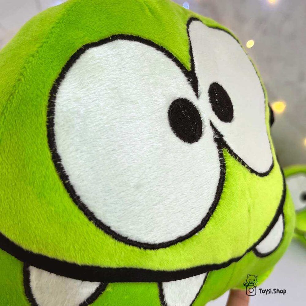 عروسک پولیشی نرم اورجینال وارداتی خارجی اوم نوم سبز ابنبات خور