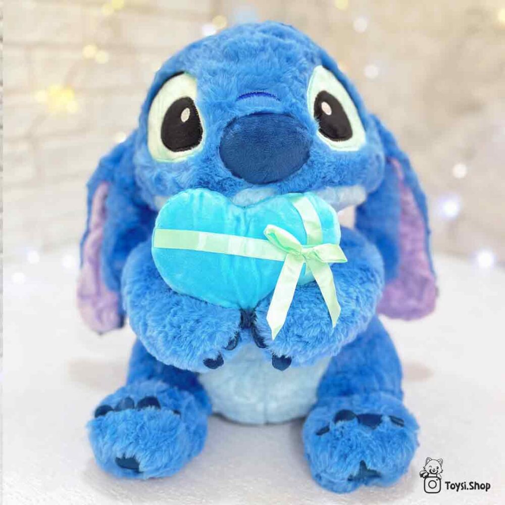 خرید عروسک استیچ آبی قلب بدست