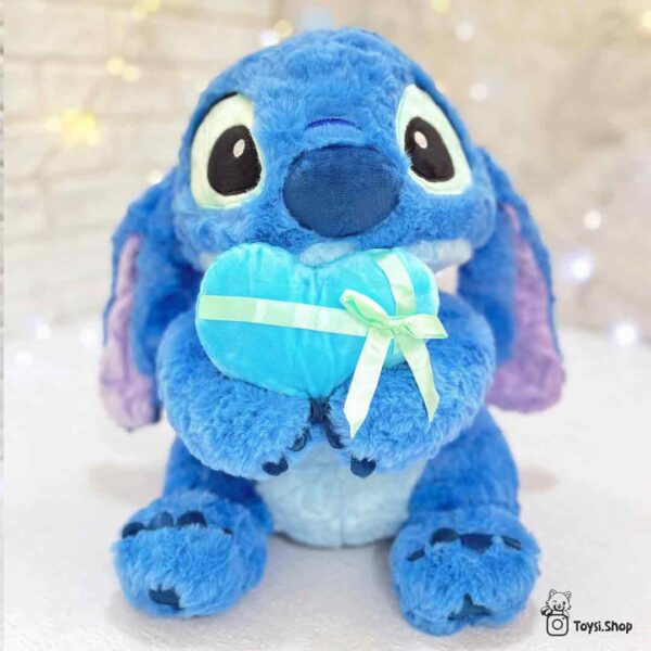 خرید عروسک استیچ آبی قلب بدست